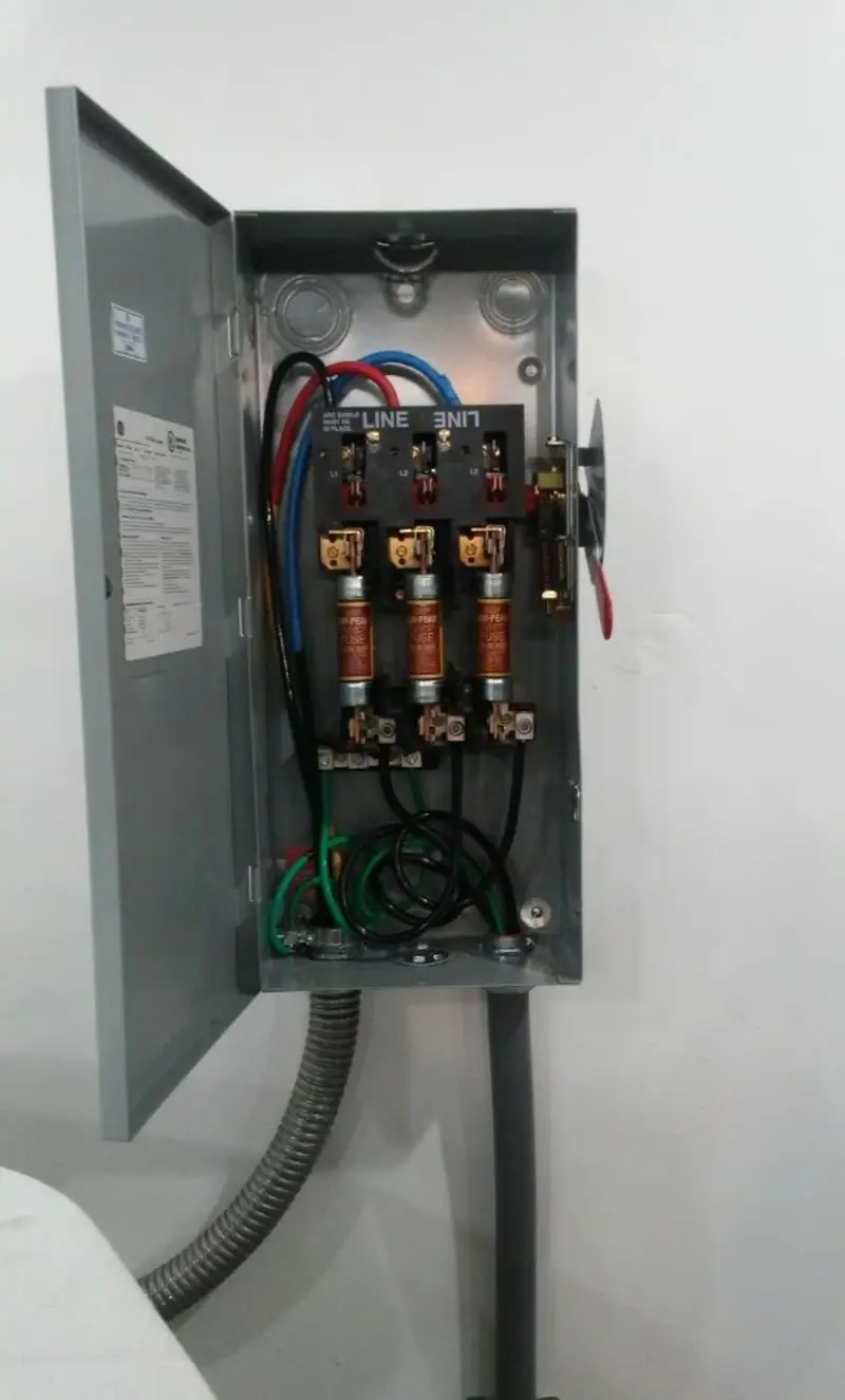 Three-phase disconnect switch installed for Smoke Detector Installation in Mayfair
